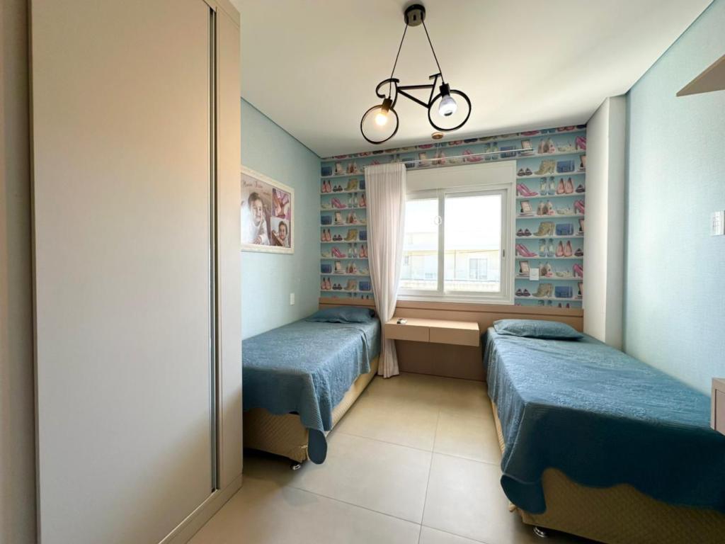 Casa em Condominio 4 Dormitórios